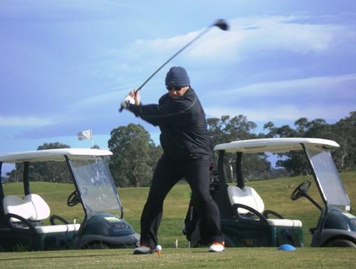 Rossco_drives_8th.JPG